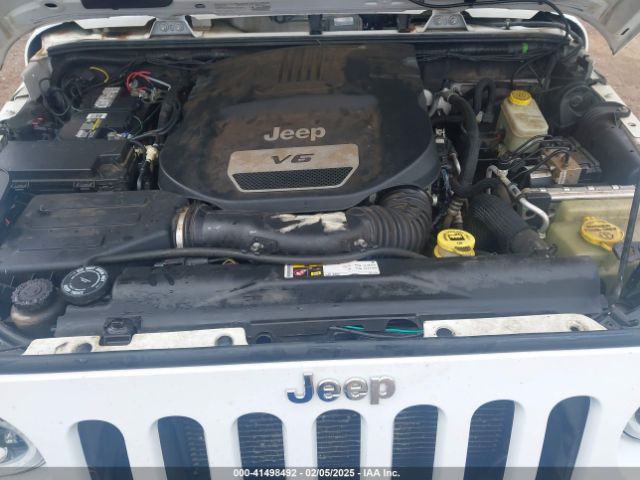 1C4BJWEG6EL245986 Jeep Wrangler Unlimited Sahara