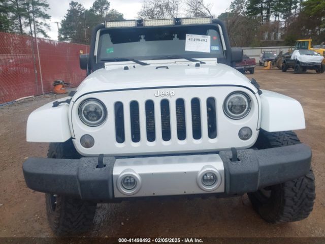 1C4BJWEG6EL245986 Jeep Wrangler Unlimited Sahara