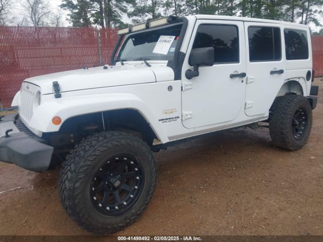 1C4BJWEG6EL245986 Jeep Wrangler Unlimited Sahara