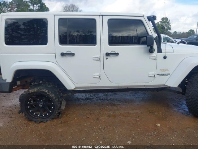 1C4BJWEG6EL245986 Jeep Wrangler Unlimited Sahara