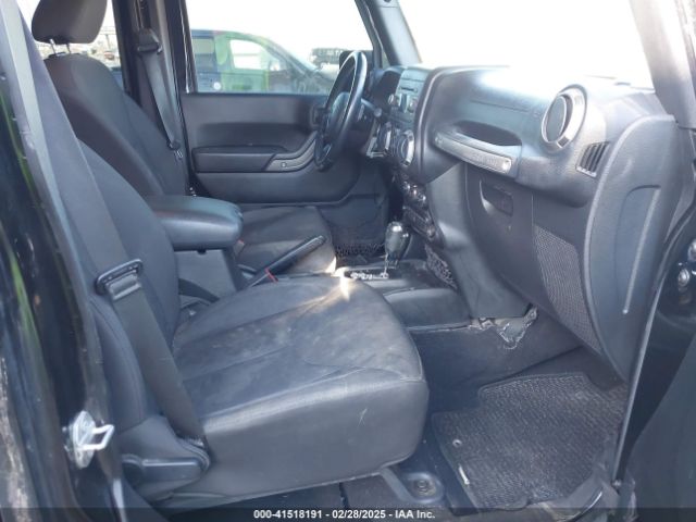 1C4HJWDG5GL278394 Jeep Wrangler Unlimited Sport
