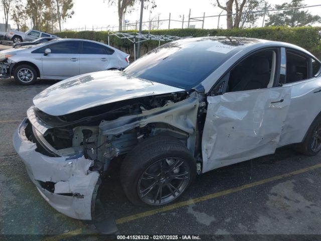 7SAYGDEE4RF177503 Tesla Model Y Long Range Dual Motor All-wheel Drive
