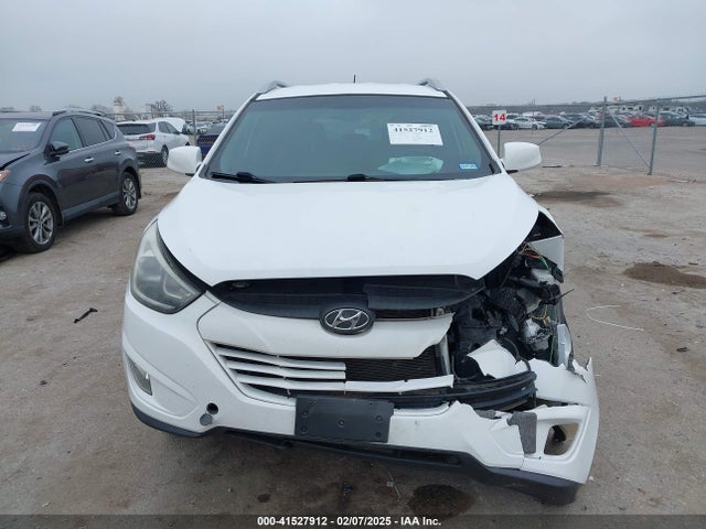 KM8JU3AG6EU879974 Hyundai TUCSON SE