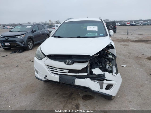 KM8JU3AG6EU879974 Hyundai TUCSON SE
