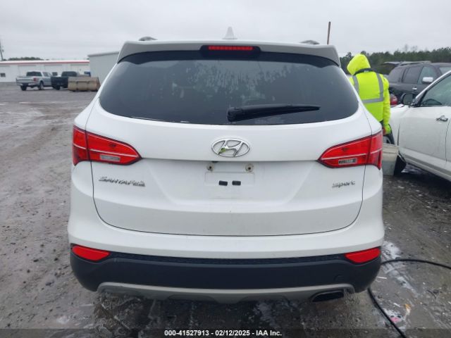 5XYZU3LB4EG150267 Hyundai Santa Fe Sport 2.4l