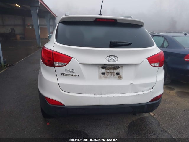 KM8JU3AG0EU880635 Hyundai TUCSON SE