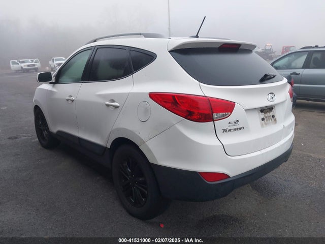 KM8JU3AG0EU880635 Hyundai TUCSON SE