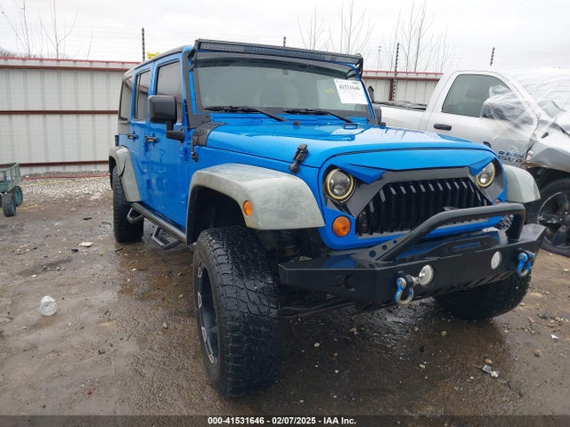 41531646 :رقم المزاد ، 1J4BA3H11BL600915 vin ، 2011 Jeep Wrangler Unlimited Sport مزاد بيع