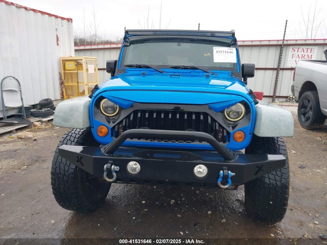 41531646 :رقم المزاد ، 1J4BA3H11BL600915 vin ، 2011 Jeep Wrangler Unlimited Sport مزاد بيع
