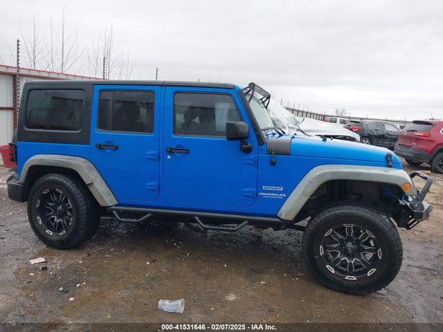 41531646 :رقم المزاد ، 1J4BA3H11BL600915 vin ، 2011 Jeep Wrangler Unlimited Sport مزاد بيع