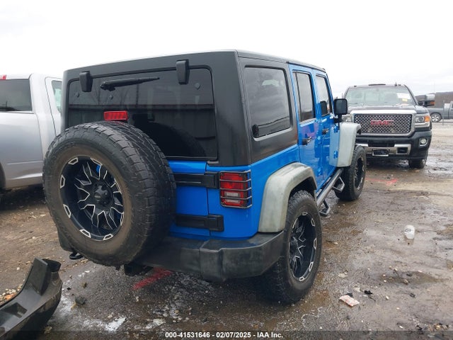41531646 :رقم المزاد ، 1J4BA3H11BL600915 vin ، 2011 Jeep Wrangler Unlimited Sport مزاد بيع