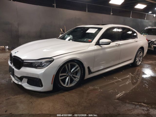 2019 BMW 740I WBA7E4C59KGV70391 Photo 1