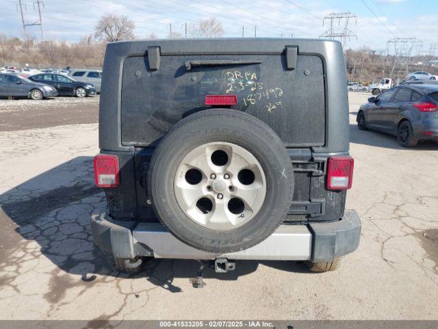 1C4BJWEG8EL187492 Jeep Wrangler Unlimited Sahara