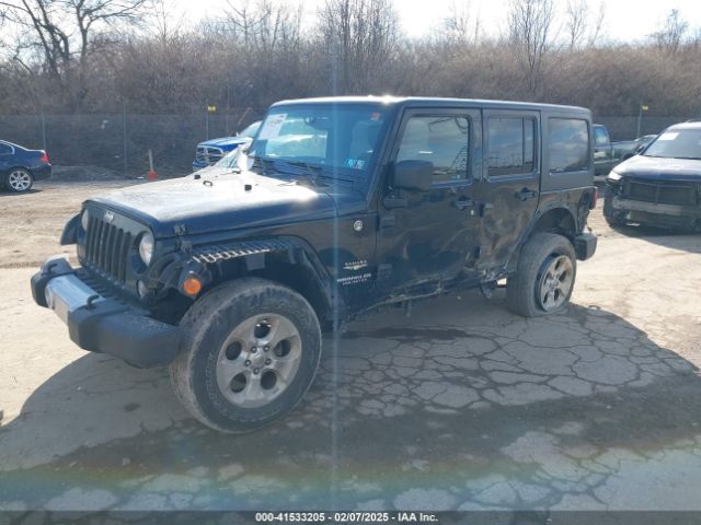 1C4BJWEG8EL187492 Jeep Wrangler Unlimited Sahara