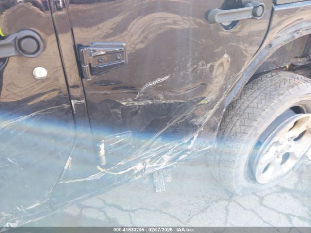 1C4BJWEG8EL187492 Jeep Wrangler Unlimited Sahara