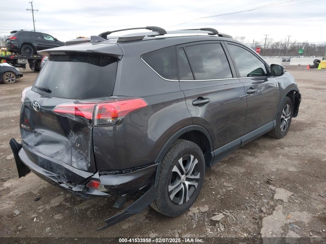 JTMZFREVXJJ178010 Toyota RAV4 LE