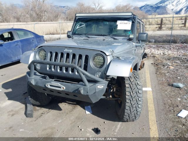 1C4BJWDG3EL161075 Jeep Wrangler Unlimited Freedom Edition