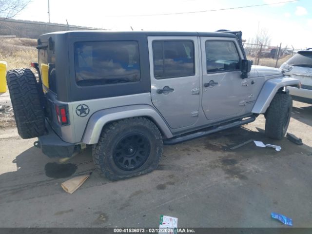 1C4BJWDG3EL161075 Jeep Wrangler Unlimited Freedom Edition