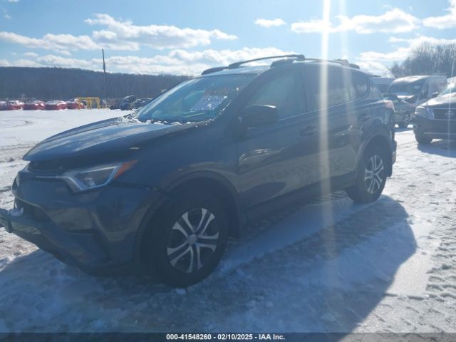 JTMBFREV1JJ230173 Toyota RAV4 LE