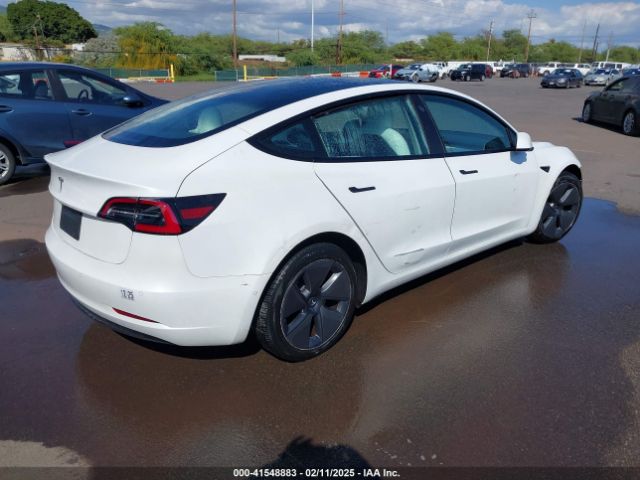 5YJ3E1EA1NF241533 Tesla 2022