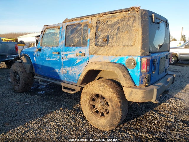 1C4BJWDG5GL187647 Jeep Wrangler Unlimited Sport