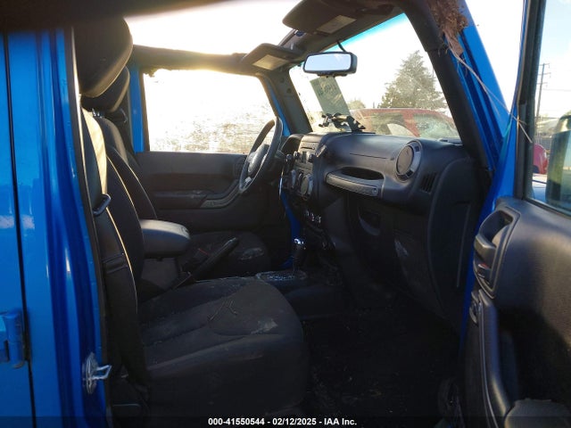 1C4BJWDG5GL187647 Jeep Wrangler Unlimited Sport