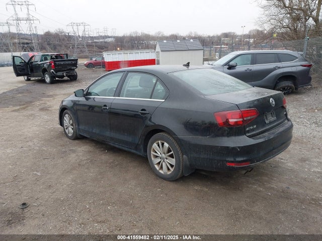 3VWD67AJ3GM384859 Volkswagen Jetta