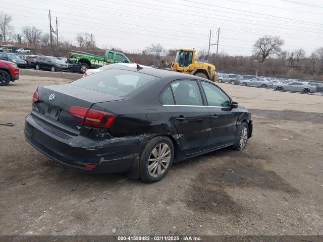 3VWD67AJ3GM384859 Volkswagen Jetta