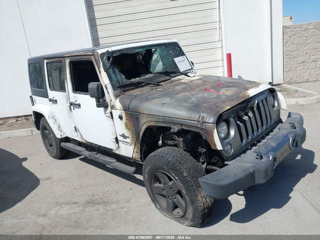 2015 Jeep Wrangler Unlimited Freedom Edition მანქანა იყიდება აუქციონზე, vin: 1C4BJWDG9FL619669, აუქციონის ნომერი: 41562097