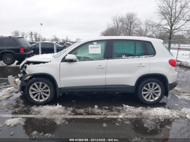 WVGBV3AX4EW529023 Volkswagen TIGUAN SE