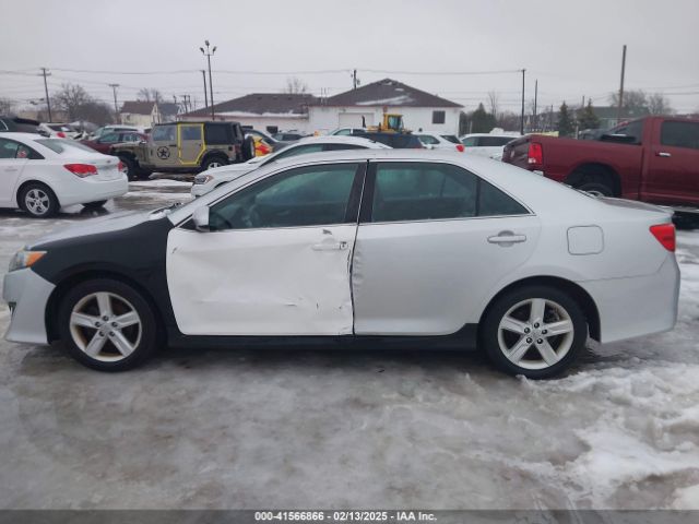 4T1BF1FKXEU398075 Toyota CAMRY SE