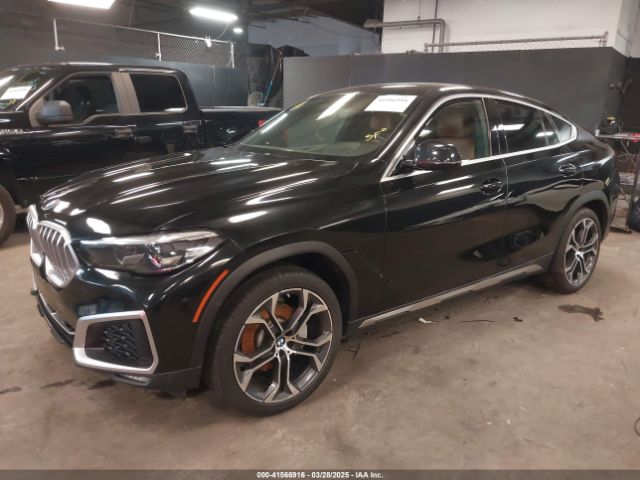 2021 BMW X6 5UXCY6C07M9E51305 Photo 1