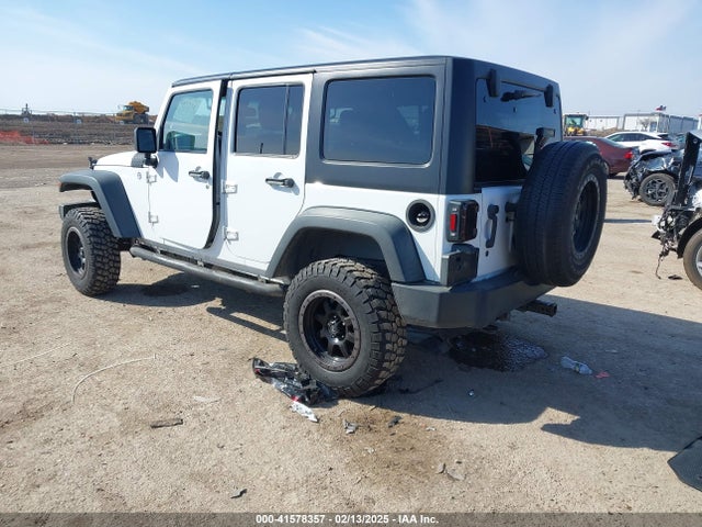 1C4BJWDG2EL100591 Jeep Wrangler Unlimited Sport