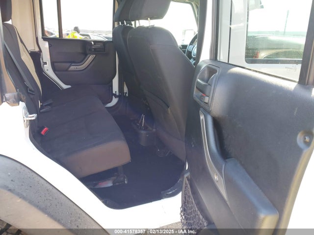 1C4BJWDG2EL100591 Jeep Wrangler Unlimited Sport
