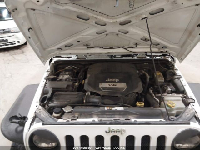 1C4HJWDG7EL190072 Jeep Wrangler Unlimited Sport
