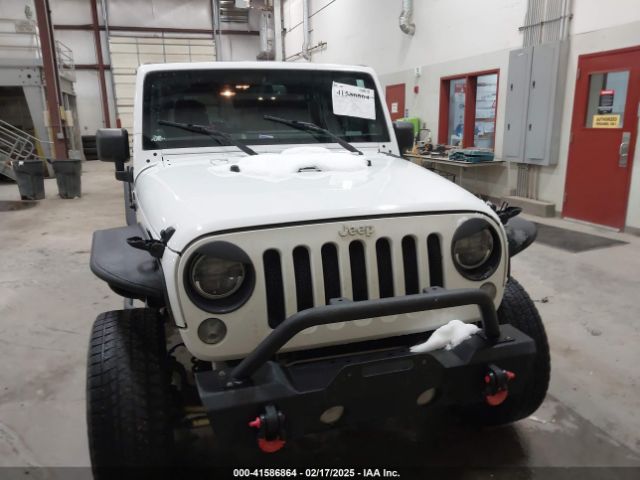 1C4HJWDG7EL190072 Jeep Wrangler Unlimited Sport