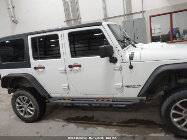 1C4HJWDG7EL190072 Jeep Wrangler Unlimited Sport