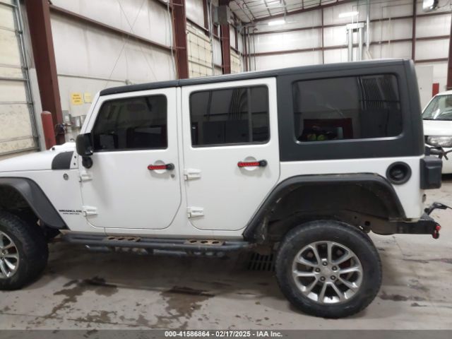 1C4HJWDG7EL190072 Jeep Wrangler Unlimited Sport