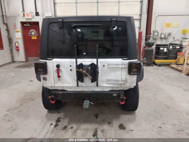 1C4HJWDG7EL190072 Jeep Wrangler Unlimited Sport