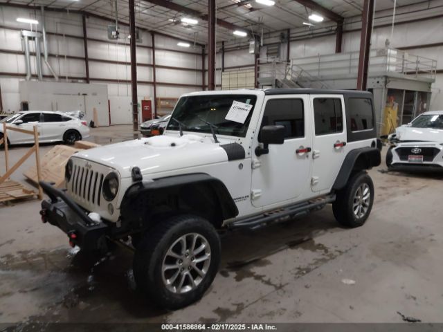 1C4HJWDG7EL190072 Jeep Wrangler Unlimited Sport