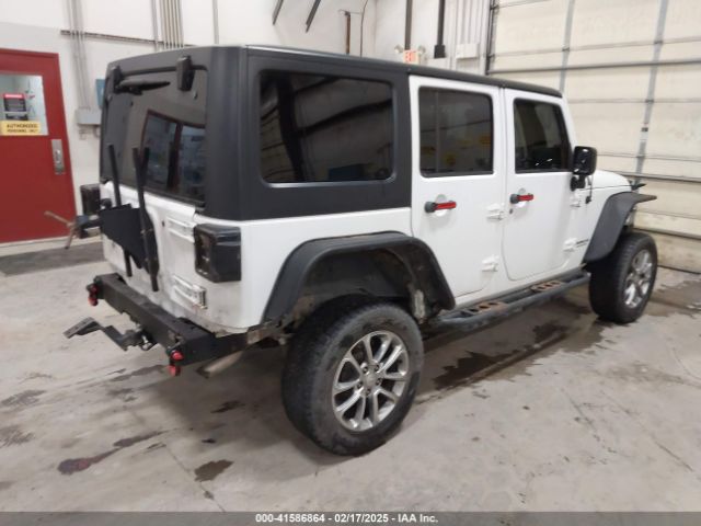 1C4HJWDG7EL190072 Jeep Wrangler Unlimited Sport