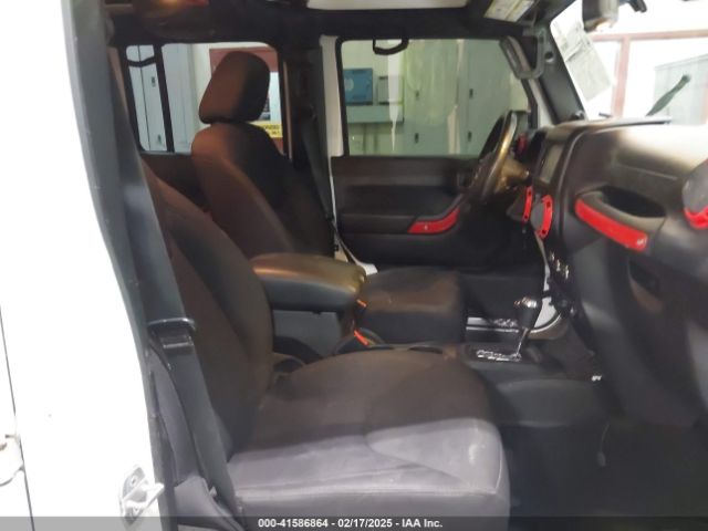 1C4HJWDG7EL190072 Jeep Wrangler Unlimited Sport