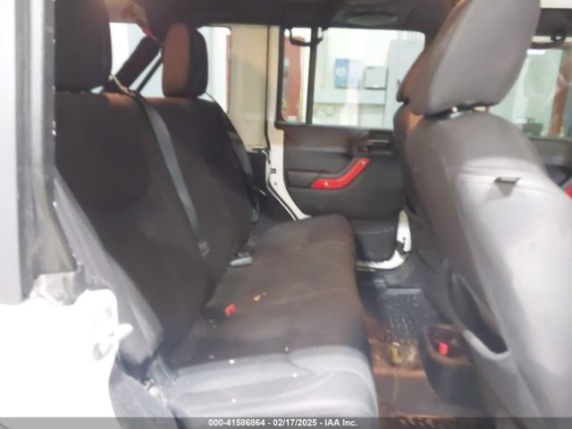 1C4HJWDG7EL190072 Jeep Wrangler Unlimited Sport