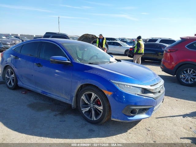 Honda Civic Touring 2016 19XFC1F94GE205044 Image 1
