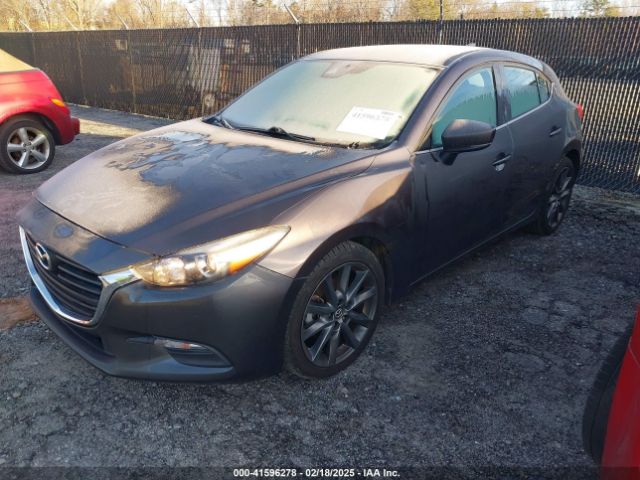 3MZBN1L32JM235162 Mazda Mazda3 Touring