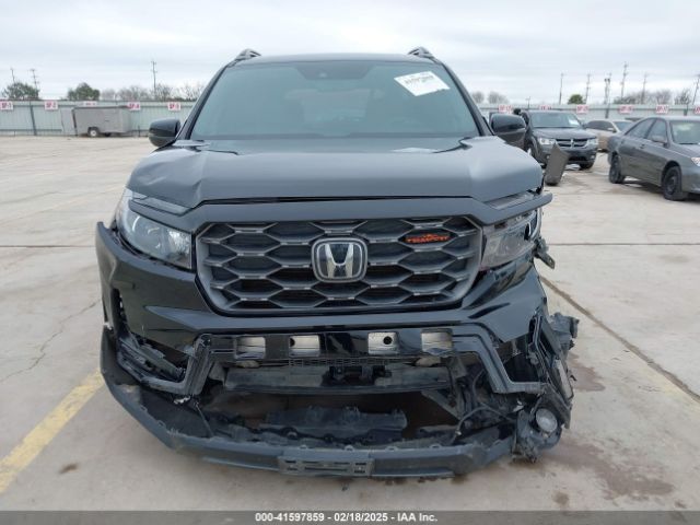 5FNYF8H67PB006933 Honda Passport Awd Trailsport