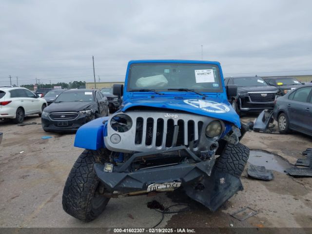 1C4HJWDG2FL592793 Jeep Wrangler Unlimited Freedom Edition