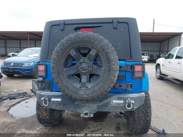 1C4HJWDG2FL592793 Jeep Wrangler Unlimited Freedom Edition