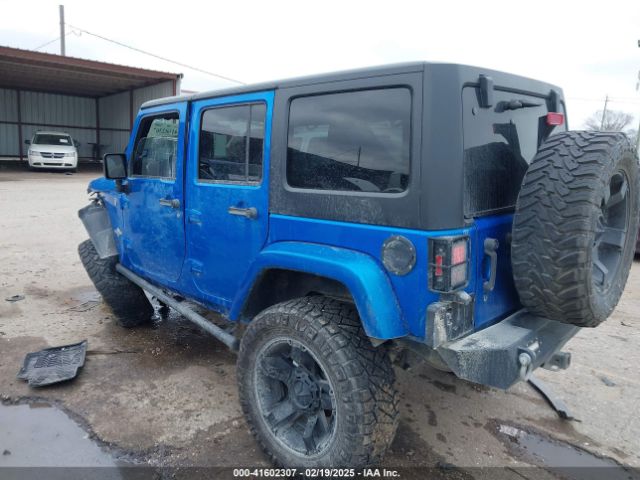 1C4HJWDG2FL592793 Jeep Wrangler Unlimited Freedom Edition