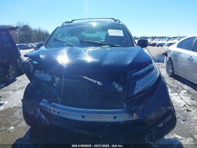 5FNYF8H01KB002512 Honda Passport Elite